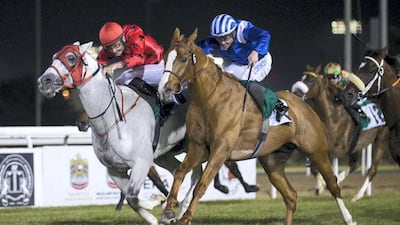 Muraaqib, right, tussles with RB Burn in the €1.2million Group 1 Sheikh Zayed bin Sultan Al Nahyan Jewel Crown race at Abu Dhabi Racecourse on Friday. After a stewards inquiry, Muraaqib, who had finished second, was awarded the race win. Erika Rasmussen for The National