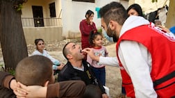 A Lebanese man receives a cholera vaccine during a vaccination campaign on November 12, 2022. Economies and efficiencies forced by funding changes could be opportunities to help countries stand on their own feet. EPA