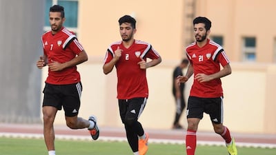 Amer Abdulrahman, centre, has moved to Al Ain on a three year contract, and will bolster their squad ahead of the Asian Champions League quarter-final. Courtesy UAE FA