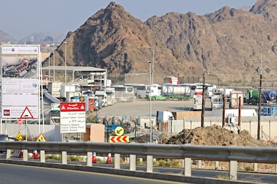 A queue of lorries at the customs centre of the Hatta Border Crossing station in the UAE. AFP