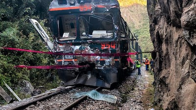 A train bears the scars of a deadly head-on collision with another engine, on a track leading to Machu Picchu in south-eastern Peru. AFP