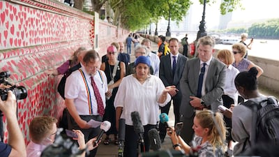 Dr Salayha Ahsan, who lost her father during the pandemic, speaks to the media as the British Medical Association join the Trades Union Congress and Covid-19 Families for Justice at the Covid Memorial Wall in London, to respond to the publication of the first report from the UK Covid-19 Inquiry. AP