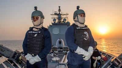 US Navy sailors stand watch on the guided-missile cruiser USS Princeton as it transits the Strait of Hormuz October 22, 2017. Reuters