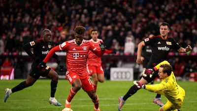 Bayern's Kingsley Coman rounds Berlin goalkeeper Frederik Ronnow before scoring. Getty