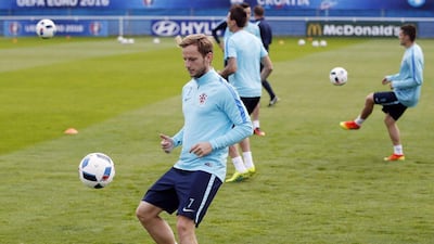 Croatia midfielder Ivan Rakitic attends a training session in Deauville on June 23, 2016, during the Euro 2016 football tournament. Charly Triballeau / AFP