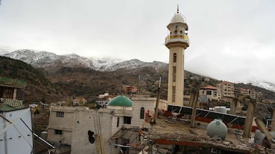 The minaret of a mosque stands amid the destruction of the southern Lebanese border village of Shebaa. AFP
