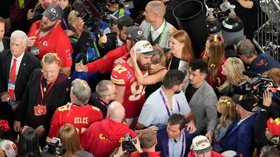Kansas City Chiefs' tight end Travis Kelce hugs his girlfriend Taylor Swift after the 25-22 victory over San Francisco 49ers to win the Super Bowl in Las Vegas. AP