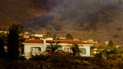Authorities ordered thousands of residents to leave as lava flows destroyed isolated houses and threatened to reach the coast. AP