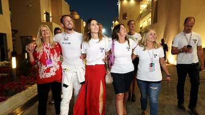 Jenson Button of Great Britain and McLaren walks through the paddock after failing to finish the Abu Dhabi Formula One Grand Prix at Yas Marina Circuit. Christopher Pike / The National