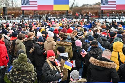 Spectators gather ahead of Mr Biden's speech in Warsaw. Getty