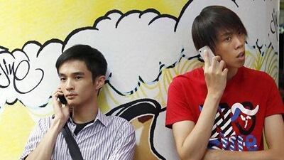 The pace of new mobile subscriptions has slowed in China, but overall industry revenue still rose 7.9% in the first five months of the year. Bobby Yip / Reuters