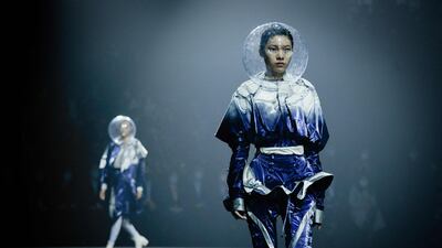 Models display creations for the Hempel Award, the 29th China International Young Fashion Designers Contest, during China Fashion Week. AFP