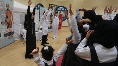 Children take part in an interactive workshop run by the Abu Dhabi Development Technology Committee in the capital yesterday, Delores Johnson / The National