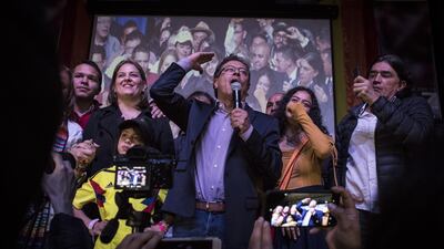 Gustavo Petro, presidential candidate for the Progressivists Movement Party, center, speaks during an election night event at the party's headquarters in Bogota, Colombia, on Sunday, May 27, 2018. Nicolo Filippo Rosso/Bloomberg