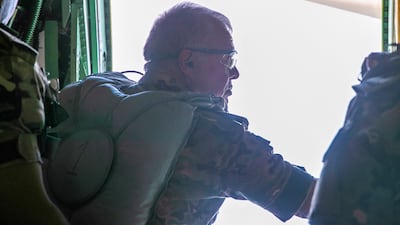 The Jordanian monarch took part as planes flew low to drop the parcels containing food, medicine and fuel. Reuters