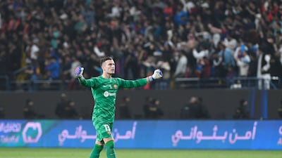 Osasuna's goalkeeper Aitor Fernandez gestures to his supporters at Al Awwal Park. Reuters