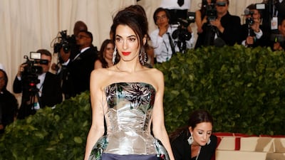 Amal Clooney, in a Richard Quinn creation, arrives at the Met Gala in New York on May 7, 2018. EPA