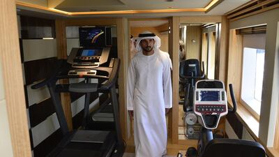 The Dubai Crown Prince tours the interior of a yachts on display at the Dubai International Boat Show.