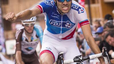 FDJ's French rider Thibaut Pinot celebrates his stage victory on Saturday in the sixth stage of the Criterium du Dauphine. Lionel Bonaventure / AFP / June 11, 2016