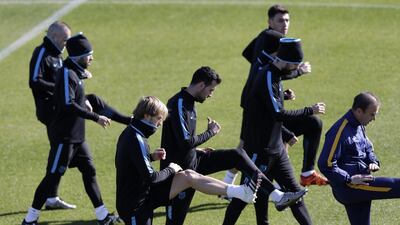 Ivan Rakitic and his Barcelona teammates take part in a training session. Kiyoshi Ota / EPA