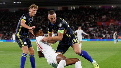 England's Marcus Rashford in action with Kosovo's Amir Rrahmani. Reuters
