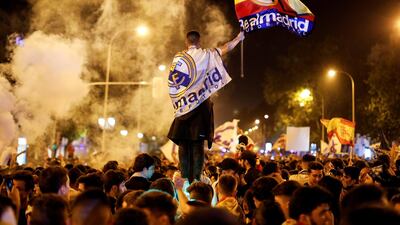Real Madrid fans celebrate near the Cibeles fountain in central Madrid. Paul Hanna / Reuters
