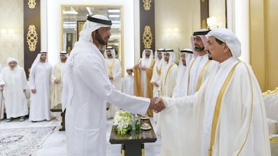 HH Sheikh Humaid and Sheikh Ammar receive well-wishers at Al Zaher Palace. WAM