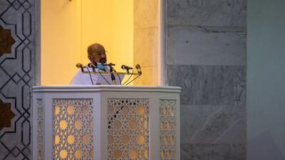 An imam delivers a sermon at Namira Mosque. REUTERS