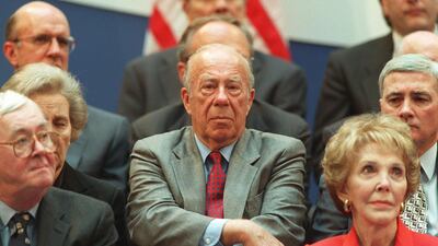 George Shultz, former US First Lady Nancy Reagan and Senator Daniel Patrick Moynihan listen to speakers during dedication ceremonies of the new Ronald Reagan Building and International Trade Centre in Washington on May 5, 1998. AFP