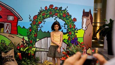 A girl has her photograph taken ‘down on the farm’ at Mirdif City Centre mall in Dubai.