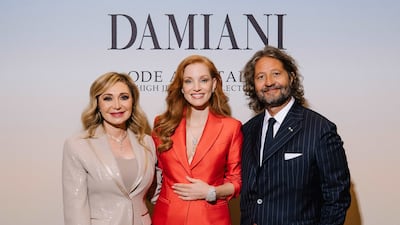 From left, Silvia Damiani, Jessica Chastain and Guido Damiani at the Damiani boutique in Dubai. Photo: Damiani