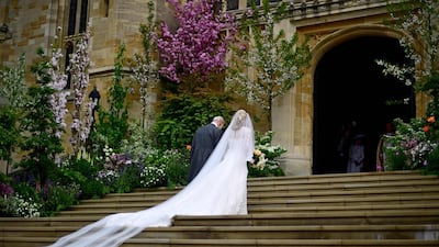 Lady Gabriella Windsor and her father make their way into St George's Chapel in Windsor Castle. AFP