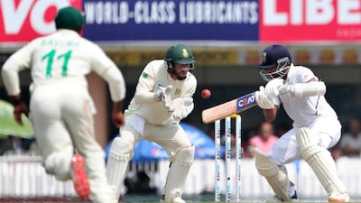 South Africa wicketkeeper Heinrich Klaasen ready to catch out India batsman Ajinkya Rahane. AP