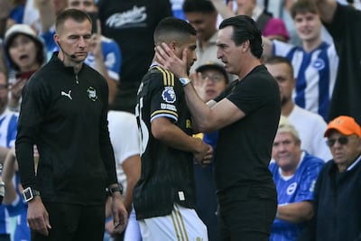 Aston Villa manager Unai Emery, right, saw his side lose 4-0 to Brighton and midfielder Joao Gomes sent off on the opening day of the season. AFP