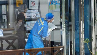 Police officers investigate at a facility for the disabled, where a deadly attack by a knife-wielding man took place, in Sagamihara, Kanagawa prefecture, Japan. Issei Kato / Reuters