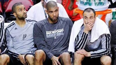 San Antonio Spurs' Tony Parker, left, Tim Duncan and Manu Ginobili combined for only 27 points in a Game 2 loss to Miami Heat. Joe Skipper / Reuters