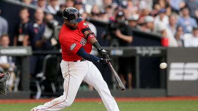 Boston Red Sox's Eduardo Nunez hits an RBI-single against the New York Yankees. AP Photo