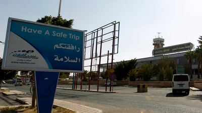 A sign wishes passengers a safe trip at Sanaa International Airport. According to some reports, the first flights will be to Egypt's capital Cairo. AFP