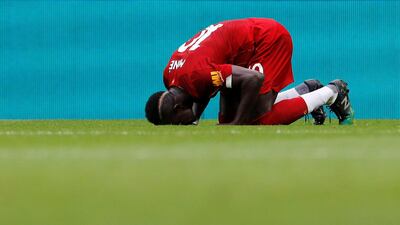 Liverpool's Sadio Mane celebrates scoring the first goal. Reuters