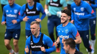 West Ham United's English midfielder Declan Rice (R) takes part in a training session at West Ham United's training ground in east London, on May 4, 2022, on the eve of their UEFA Europa League semi-final second leg football match against Eintracht Frankfurt. (Photo by JUSTIN TALLIS / AFP)