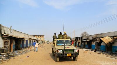 South Sudanese soldiers drive through Malakal in 2013. Clashes this year between armed groups aligned with government and opposition forces have subjected civilians to 'unimaginable violence', says Amnesty International. Reuters