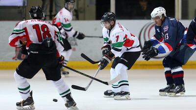 Juma Al Dhaheri, No 7 in white, of the UAE in action during their 6-1 win over Thailand in the IIHF Challenge Cup of Asia at Abu Dhabi Ice Rink, Zayed Sports City, last Saturday. They followed up that win with a 5-1 triumph over Mongolia last night to set up a potential decider against Chinese Taipei in the final round on Friday. Meanwhile, Chinese Taipei, the reigning champions, hammered Singapore 14-2 in the early game. Tonight, they meet Mongolia while Thailand face Singapore. Pawan Singh / The National