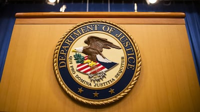 The US Department of Justice seal. Bloomberg / Getty Images