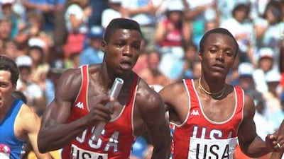 At the age of 19, Carl Lewis, left, set his first world record by jumping 8.50 metres. AP Photo