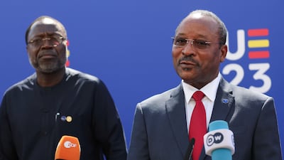 Ecowas President Omar Alieu Touray looks on as Minister of Foreign Affairs of Niger Hassoumi Massaoudou speaks to the media following an EU foreign ministers meeting in Toledo, Spain. Reuters