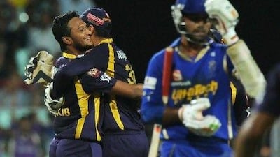 Shakib Al Hasan, left, the Kolkata Knight Riders bowler, took the key wicket of Rajasthan Royals opener Ajinkya Rahane. Dibyangshu Sarkar / AFP