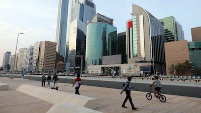 Abu Dhabi's total property transactions surged 112 per cent year-on-year to hit Dh117 billion in the first half of this year. Chris Whiteoak / The National