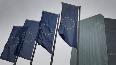 Flags of the European Union fluttering in front of the headquarters of the European Central Bank (ECB) in Frankfurt, Germany. Disagreement remains among the EU27 nations around the size and type of a proposed €500bn bailout package to tackle the economic effects of the Covid-19 pandemic. AFP