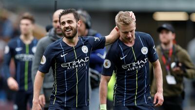 Manchester City's Bernardo Silva and Oleksandr Zinchenko celebrate after the match. Reuters
