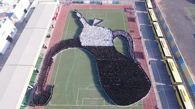 India International School in Sharjah got 5,500 students together to create a coffee pot. Courtesy Guinness World Records